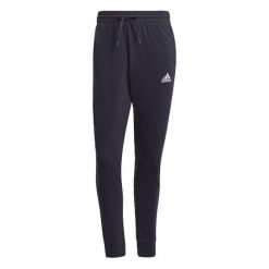Spodnie męskie adidas Essentials Single. Białe spodnie materiałowe męskie Adidas, bez wzorów. Za 122.99 zł.