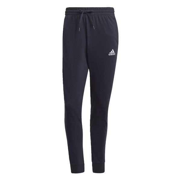 Spodnie męskie adidas Essentials Single. Białe spodnie materiałowe męskie Adidas, bez wzorów. Za 122.99 zł.