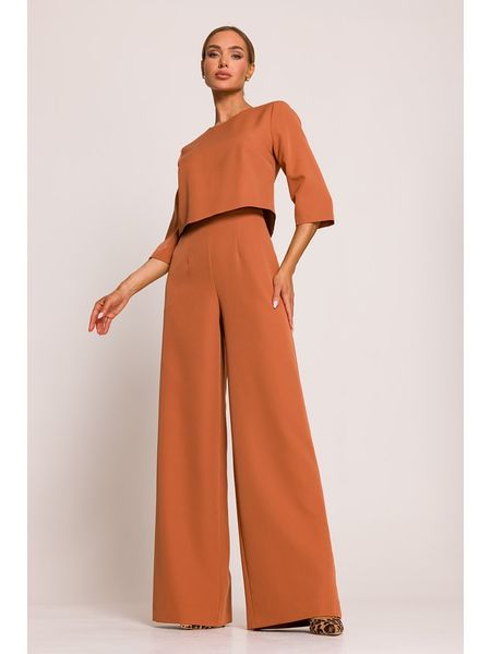 Made of emotion Kombinezon w kolorze pomarańczowym rozmiar: M. Pomarańczowe kombinezony damskie Made Of Emotion, m, bez wzorów, bez kołnierzyka, bez ramiączek. Za 300.92 zł.