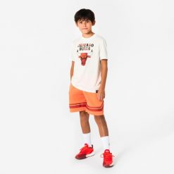 Koszulka do koszykówki dla dzieci NBA 900 Chicago Bulls. Białe koszulki dziewczęce TARMAK, m, bez wzorów, z materiału, bez ramiączek. Za 59.99 zł.
