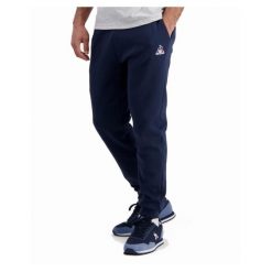 Spodnie do biegania Le Coq Sportif Essentiels N°1. Niebieskie spodnie materiałowe męskie Le Coq Sportif, bez wzorów, sportowe. Za 366.50 zł.