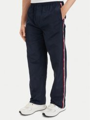 Tommy Jeans Spodnie dresowe DM0DM23123 Granatowy Relaxed Fit. Niebieskie spodnie dresowe męskie Tommy Jeans, bez wzorów, z dresówki. Za 489.99 zł.