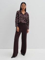 Someday Bluzka w kolorze bordowo-jasnoróżowym rozmiar: 40. Czerwone bluzki damskie Someday, bez wzorów, z wiskozy, bez kołnierzyka, bez ramiączek. Za 173.99 zł.