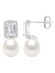 Pearline Srebrne kolczyki-wkrętki z perłami rozmiar: onesize. Białe kolczyki damskie Pearline, z cyrkonią, srebrne. Za 239.99 zł.