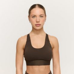Stanik sportowy damski z regulowanymi ramiączkami Limitless. Brązowe biustonosze sportowe damskie GYMBEAM, bez wzorów, z elastanu. Za 85.90 zł.