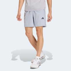 Spodenki fitness męskie ADIDAS. Szare szorty męskie Adidas, bez wzorów, ze skóry, sportowe. Za 129.99 zł.
