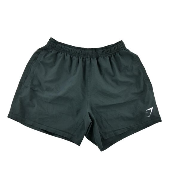 Gymshark krótkie spodenki damskie do biegania. Czarne spodenki sportowe damskie Gymshark, l, z materiału, do biegania. Za 42.56 zł.