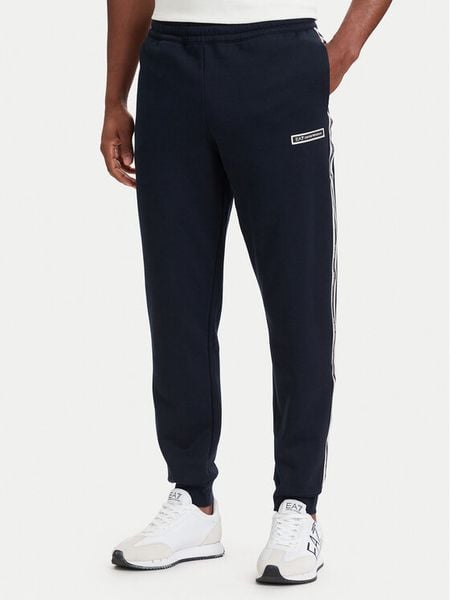 EA7 Emporio Armani Spodnie dresowe 7M002198 AF10377 UB102 Granatowy Slim Fit. Niebieskie spodnie dresowe męskie EA7 Emporio Armani, bez wzorów, z bawełny. Za 529.99 zł.