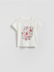 Bawełniany t-shirt z nadrukiem - złamana biel. Koszulki dziewczęce Reserved, m, bez wzorów, z bawełny, bez ramiączek. Za 25.99 zł.