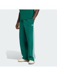 Adidas Spodnie dresowe adicolor Spacer Track KD4088 Zielony Baggy Fit. Zielone spodnie dresowe męskie Adidas, bez wzorów, z bawełny. Za 349.99 zł.