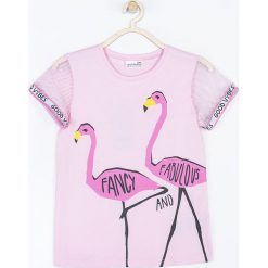 Coccodrillo - T-shirt dziecięcy 128-158 cm. Czerwone koszulki dziewczęce COCCODRILLO, bez wzorów, z bawełny, bez ramiączek. W wyprzedaży za 29.90 zł.