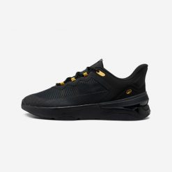 Buty sportowe męskie Domyos Teddy Riner. Czarne buty sportowe na co dzień męskie DOMYOS, z kauczuku, bez zapięcia, na fitness i siłownię. W wyprzedaży za 199.99 zł.