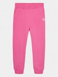 Calvin Klein Jeans Spodnie dresowe Logo IG0IG02285 Różowy Regular Fit. Czerwone spodnie dziewczęce Calvin Klein Jeans, z bawełny. Za 299.99 zł.