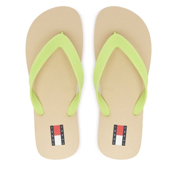 Japonki Tommy Jeans. Żółte klapki damskie Tommy Jeans, bez wzorów, z jeansu, bez obcasa. Za 129.99 zł.