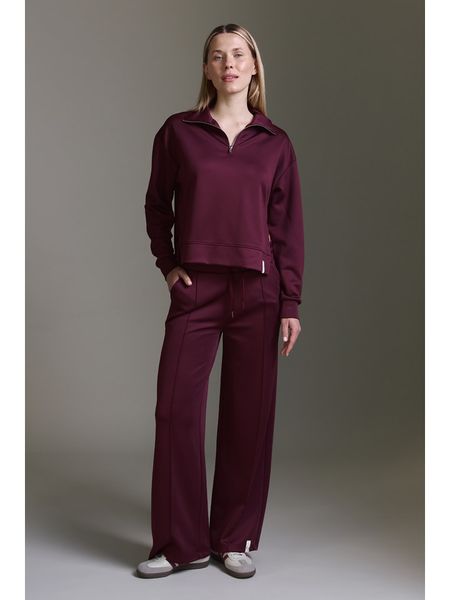 Cotton Candy Spodnie dresowe w kolorze bordowym rozmiar: XL. Czerwone spodnie dresowe damskie Cotton Candy, xl, bez wzorów, z dresówki. Za 138.87 zł.