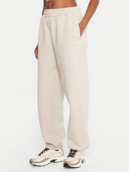 Reebok Spodnie dresowe Reebok X Ewa Chodakowska RK25304CCW Beżowy Regular Fit. Brązowe spodnie dresowe damskie Reebok, l, bez wzorów, z bawełny. Za 179.99 zł.