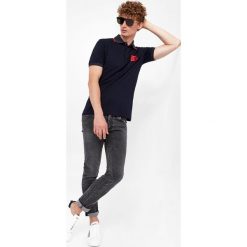 Jeansy męskie DOLCE & GABBANA. Jeansy męskie Dolce & Gabbana. W wyprzedaży za 2,729.25 zł.