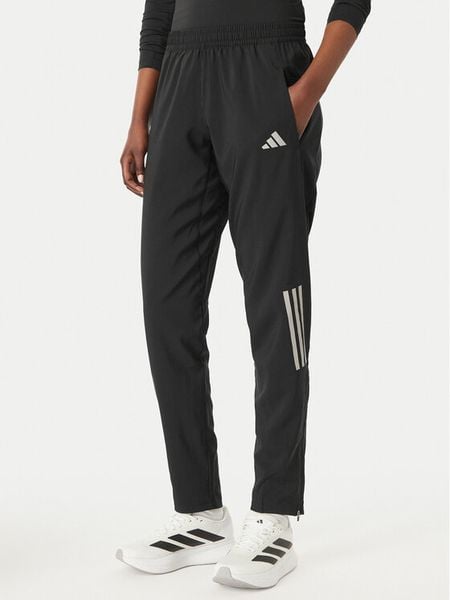 Adidas Spodnie dresowe Astro KC4947 Czarny Regular Fit. Czarne spodnie dresowe damskie Adidas, xs, bez wzorów, z dresówki. Za 269.99 zł.