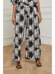 Plus Size Company Spodnie w kolorze kremowo-czarnym rozmiar: 50. Brązowe spodnie materiałowe damskie Plus Size Company, bez wzorów, z materiału, klasyczne, z podwyższonym stanem, plus size. Za 96.60 zł.