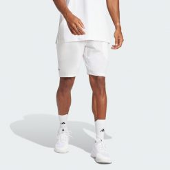 Szorty Club Tennis Climacool Stretch Woven. Białe szorty męskie Adidas, bez wzorów, sportowe. Za 179.00 zł.