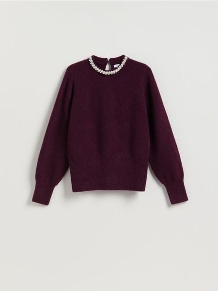 Sweter z aplikacją - ciemnofioletowy. Fioletowe swetry klasyczne damskie Reserved, l, z dzianiny, bez kołnierzyka. Za 139.99 zł.