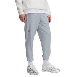 Spodnie treningowe męskie Under Armour Unstoppable Tapered. Niebieskie spodnie sportowe męskie Under Armour. Za 249.99 zł.
