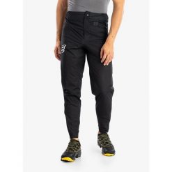 Spodnie do biegania męskie Compressport Hurricane Waterproof 10/10 Pants. Czarne spodnie materiałowe męskie Compressport, bez wzorów, sportowe. Za 549.99 zł.