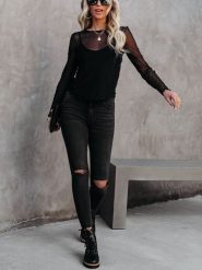 Milan Kiss Bluzka w kolorze czarnym rozmiar: M. Czarne bluzki damskie Milan Kiss, m, bez wzorów, bez kołnierzyka, bez ramiączek. Za 231.13 zł.