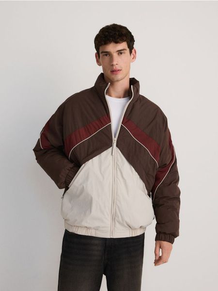 Kurtka ze stójką - wielobarwny. Kurtki męskie Reserved, l, bez wzorów, z tkaniny, bez kaptura. W wyprzedaży za 89.99 zł.