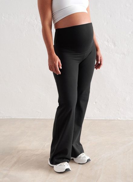 Damskie spodnie ciążowe, luźne, szerokie nogawki, wysoki stan Sense czarne. Czarne spodnie sportowe damskie Aim'n, xs, z dzianiny, na fitness i siłownię. Za 339.00 zł.