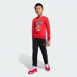 Spodnie Dresowe Adidas Disney Mickey Mouse. Białe spodnie dresowe damskie Adidas, bez wzorów, z dresówki. Za 279.00 zł.