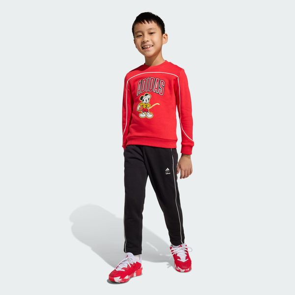 Spodnie Dresowe Adidas Disney Mickey Mouse. Białe spodnie dresowe damskie Adidas, bez wzorów, z dresówki. Za 279.00 zł.