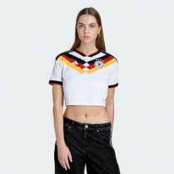 Koszulka podstawowa Niemcy 26 Cropped. Białe bluzki damskie Adidas, bez wzorów, sportowe, bez kołnierzyka, bez ramiączek. Za 369.00 zł.
