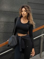 Athleas Koszulka sportowa "Ania" w kolorze czarnym rozmiar: M/L. Czarne topy sportowe damskie Athleas, l, bez wzorów, z materiału, bez ramiączek. Za 130.99 zł.