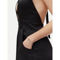 Bransoletka Guess. Żółte bransoletki damskie Guess, złote. Za 179.99 zł.