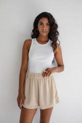 Top na ramiączkach prążkowanej dzianiny w kolorze CLASSIC WHITE - ISLA-L. Białe topy damskie Marsala, l, bez wzorów, z bawełny, bez kołnierzyka. Za 119.90 zł.