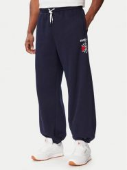 Reebok Spodnie dresowe Eryk RK25733CCM Granatowy Regular Fit. Niebieskie spodnie dresowe męskie Reebok, bez wzorów, z dresówki. Za 219.99 zł.