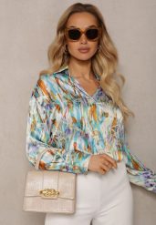 Niebiesko-Beżowa Klasyczna Koszula z Guzikami z Przedłużonymi Mankietami Keirania. Niebieskie koszule damskie Renee, l, bez wzorów, z jeansu, eleganckie, bez kołnierzyka, bez ramiączek. Za 89.99 zł.