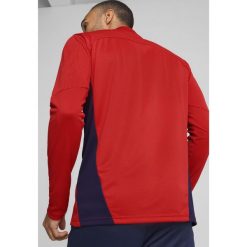 Męska bluza treningowa z zamkiem 1/4 FC Red Bull Salzburg PUMA Red Navy Blue. Czerwone bluzy bez kaptura męskie Puma, m. W wyprzedaży za 219.00 zł.