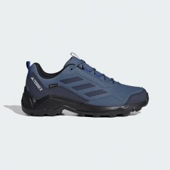 Buty Terrex Eastrail GORE-TEX Hiking. Niebieskie buty trekkingowe męskie Adidas, z gore-texu, bez zapięcia, wspinaczkowe, gore-tex. Za 510.15 zł.