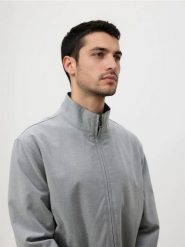 Sportowa marynarka - jasnoszary. Szare kurtki męskie Reserved, bez wzorów, z tkaniny. Za 249.99 zł.