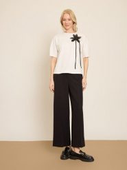 BGN Koszulka w kolorze kremowym rozmiar: 36. Brązowe bluzki damskie BGN, z aplikacjami, bez kołnierzyka, bez ramiączek. Za 56.99 zł.