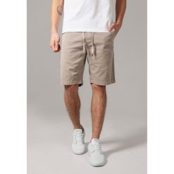 Szorty Urban Classic stretch twill jogg. Białe szorty męskie Urban Classics, bez kołnierzyka. Za 175.50 zł.