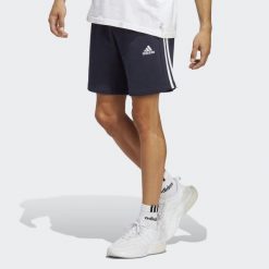 Spodenki krótkie męskie adidas Essentials French Terry 3-Stripes. Czarne szorty męskie Adidas, bez kołnierzyka. Za 119.00 zł.