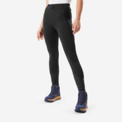Legginsy turystyczne damskie Quechua NH500 Warm. Czarne legginsy damskie QUECHUA, m, bez wzorów, z materiału. Za 199.99 zł.