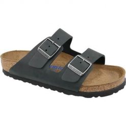 Klapki unisex Birkenstock Arizona. Czarne klapki damskie Birkenstock, bez wzorów, z materiału, bez obcasa. Za 479.00 zł.