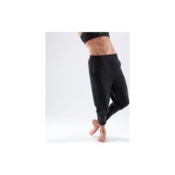 Spodnie marchewki do tańca nowoczesnego damskie. Czarne spodnie materiałowe damskie DOMYOS, z elastanu, na fitness i siłownię. Za 79.99 zł.