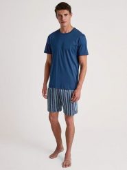 Calida Piżama w kolorze niebieskim rozmiar: XL. Niebieskie piżamy męskie Calida, xl, bez wzorów, z bawełny, bez ramiączek. Za 245.96 zł.