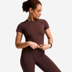 Koszulka fitness damska Domyos krótki rękaw. Brązowe bluzki damskie DOMYOS, xl, bez wzorów, z elastanu, sportowe, bez kołnierzyka, bez ramiączek. Za 69.99 zł.