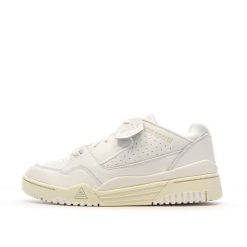 Buty sportowe męskie LCS T1000 optical white. Białe buty sportowe na co dzień męskie Le Coq Sportif, z materiału, bez zapięcia, trekkingowe. Za 332.90 zł.